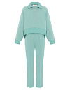 Костюм из мятного трикотажа,свитшот укороченный,брюки,лампасы с вышивкой белые буквы Yana